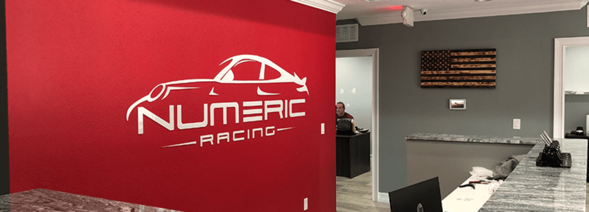 The front office wall of Numeric Racing HQ.